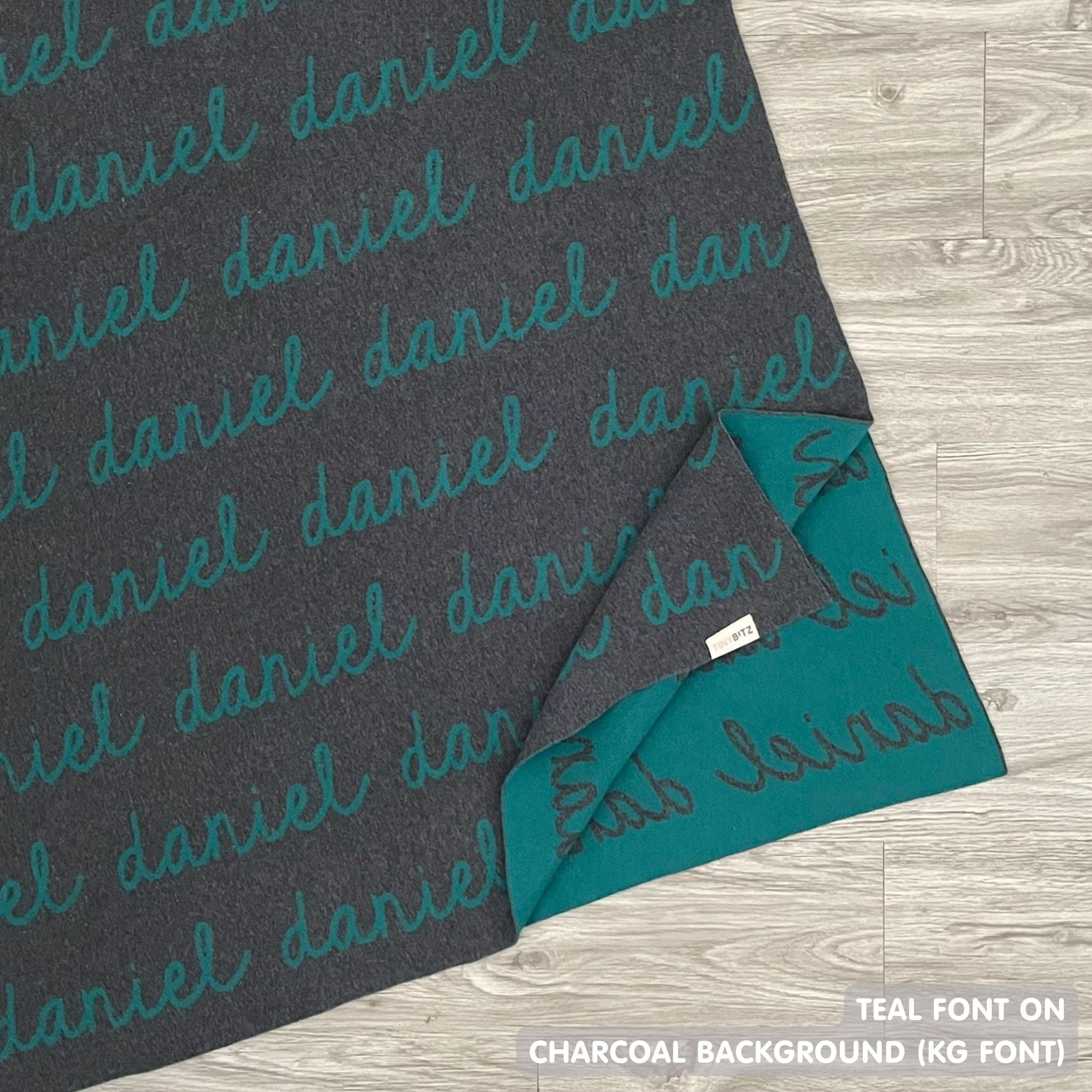 Personalised pet blanket in charcoal and teal knitted cotton, custom knitted dog blanket by TinyBitz, perfect gift for dog lovers.