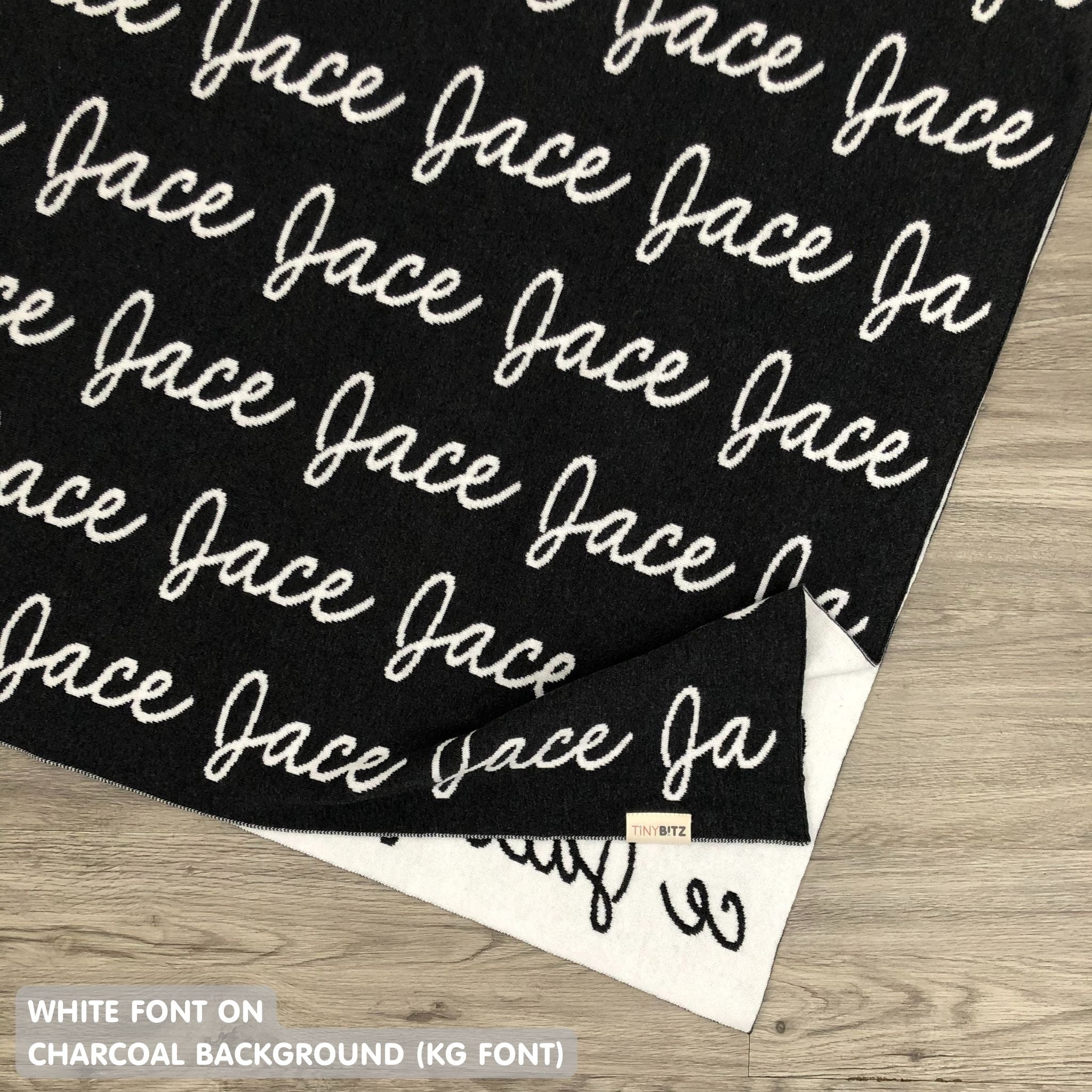 Personalised pet blanket for cats in charcoal and white knitted cotton, custom knitted cat blanket by TinyBitz, perfect gift for cat lovers.