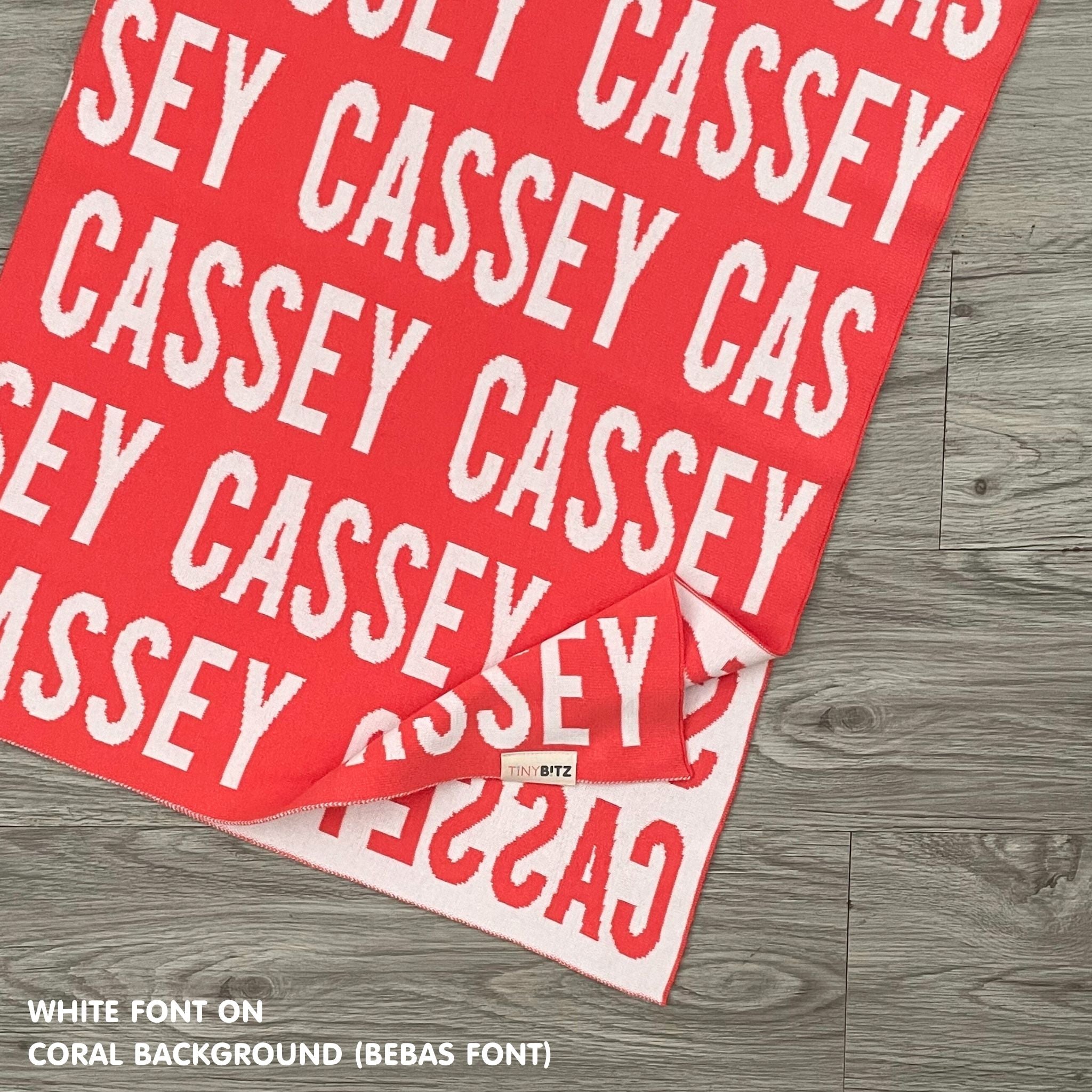 Personalised pet blanket for dogs in coral and white, custom knitted dog blanket by TinyBitz, cozy gift for small dogs.