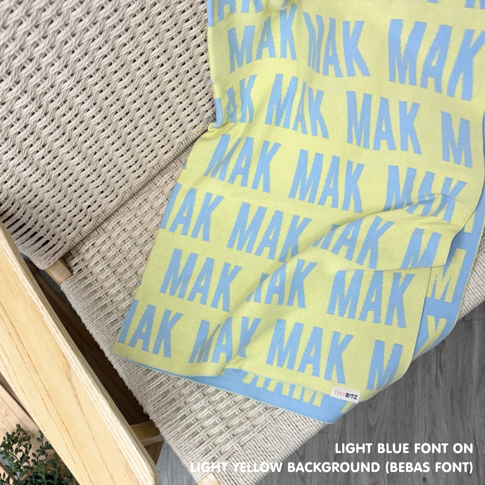 Personalised pet blanket in light yellow and light blue knitted cotton, custom knitted dog blanket by TinyBitz, perfect gift for dog lovers.