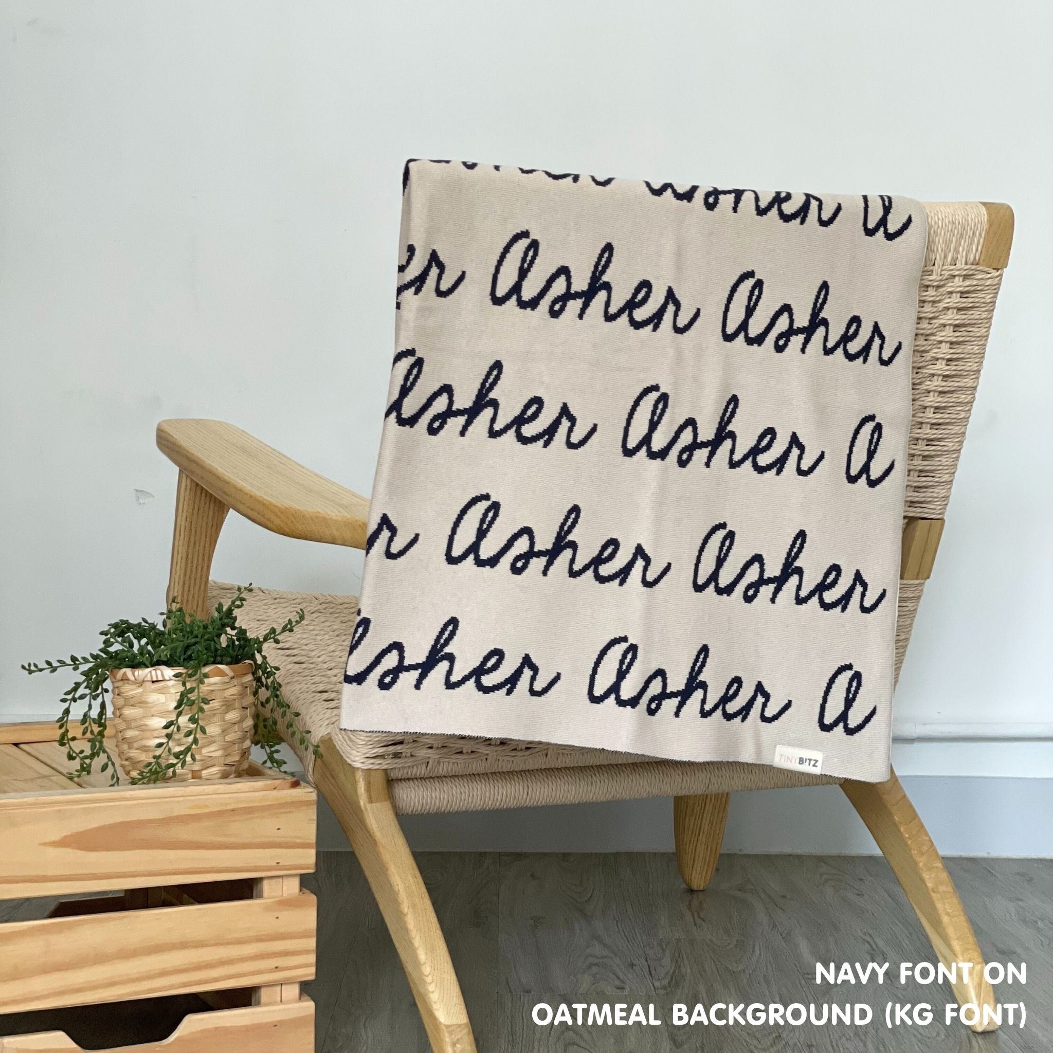 Personalised pet blanket in oatmeal and navy knitted cotton, custom knitted dog blanket by TinyBitz, perfect gift for dog lovers.