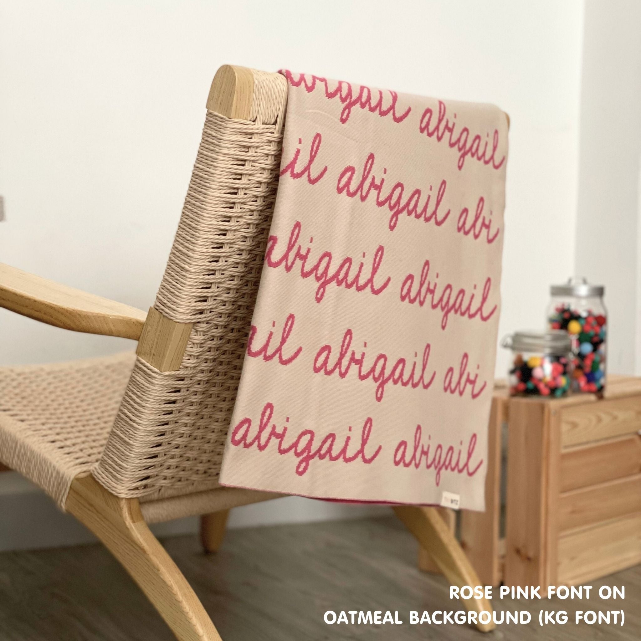 Personalised pet blanket in oatmeal and rose pink knitted cotton, cozy custom cat blanket by TinyBitz, perfect personalized gift for pet lovers.