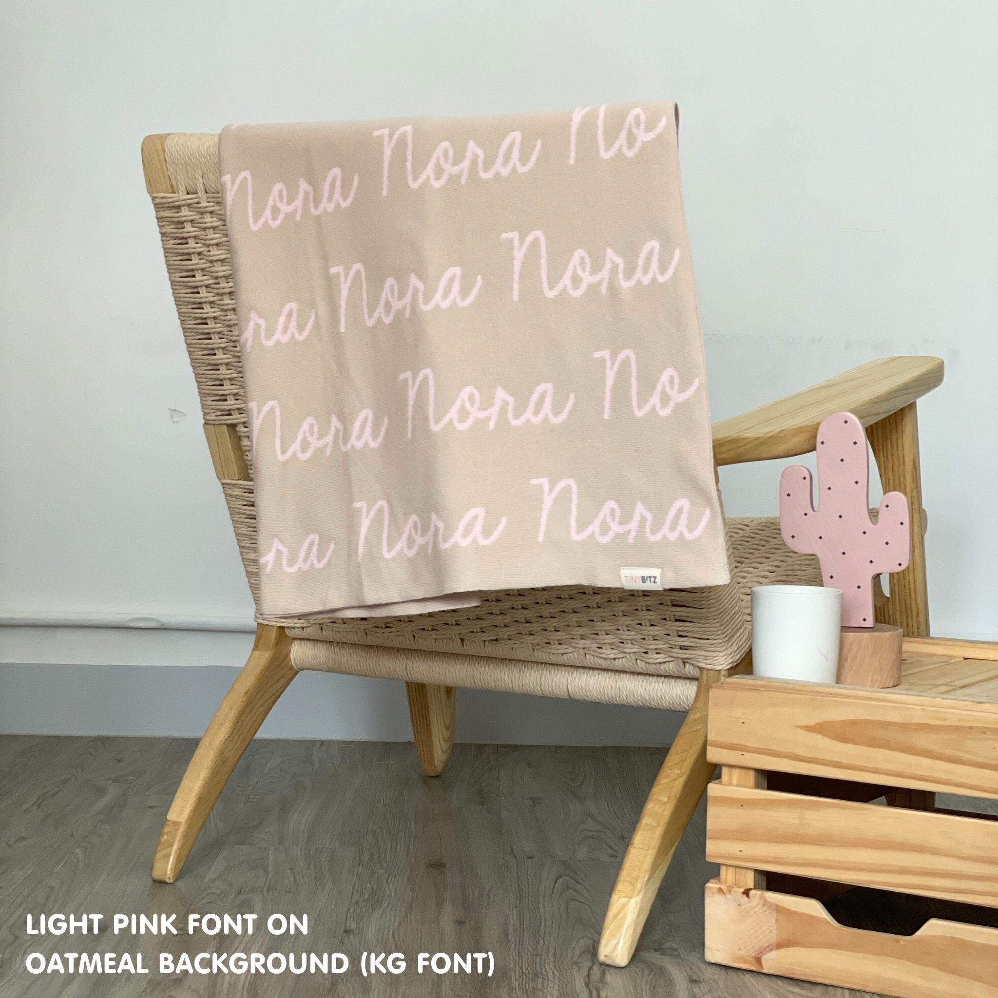 Personalised pet blanket in oatmeal and light pink knitted cotton, custom knitted dog blanket by TinyBitz, perfect gift for dog lovers.