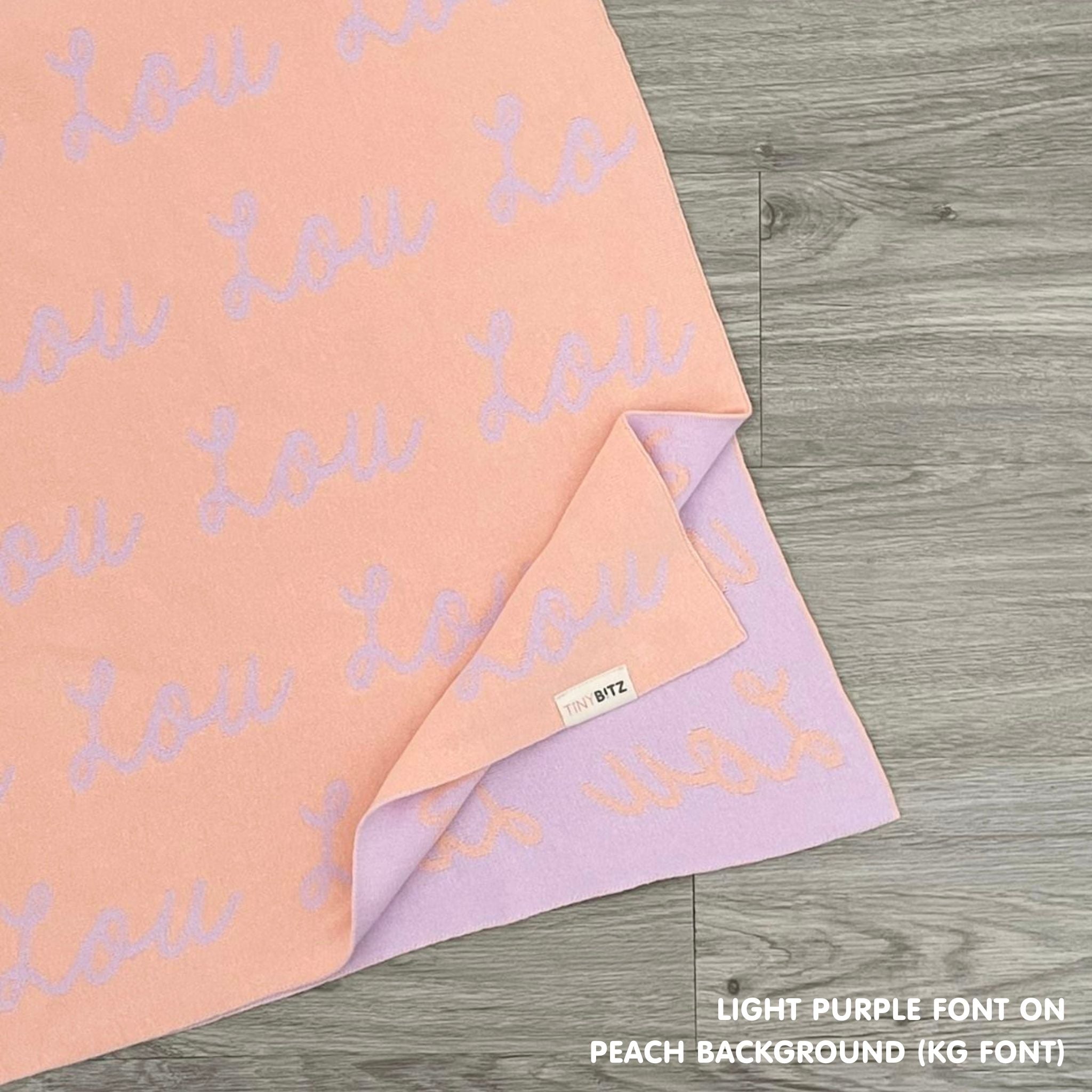 Personalised pet blanket for dogs in peach and light purple knitted cotton, custom knitted dog blanket by TinyBitz, perfect gift for cat lovers.