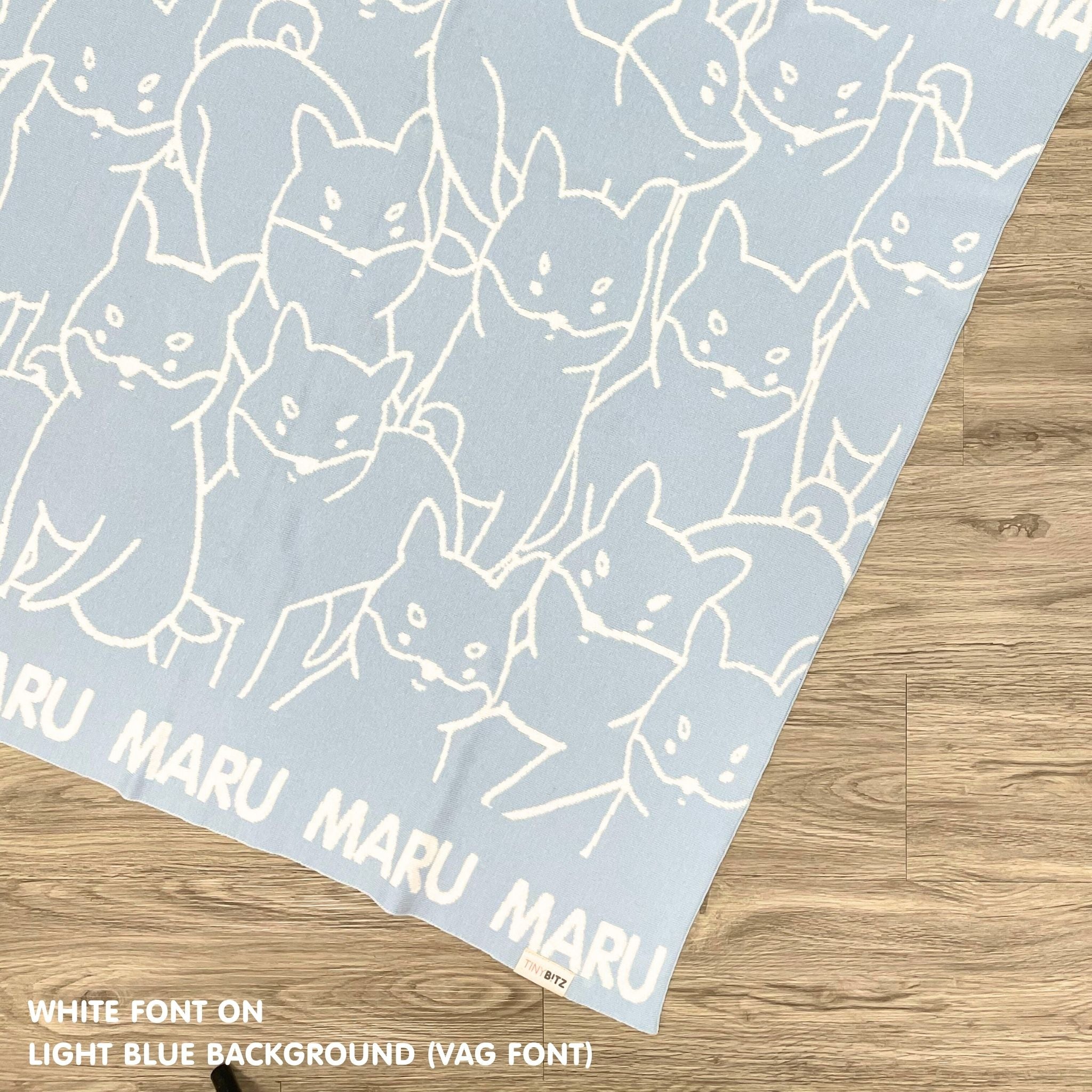 Personalised pet blanket for Shiba in light blue and white knitted cotton, custom knitted cat blanket by TinyBitz, perfect gift for dog lovers.