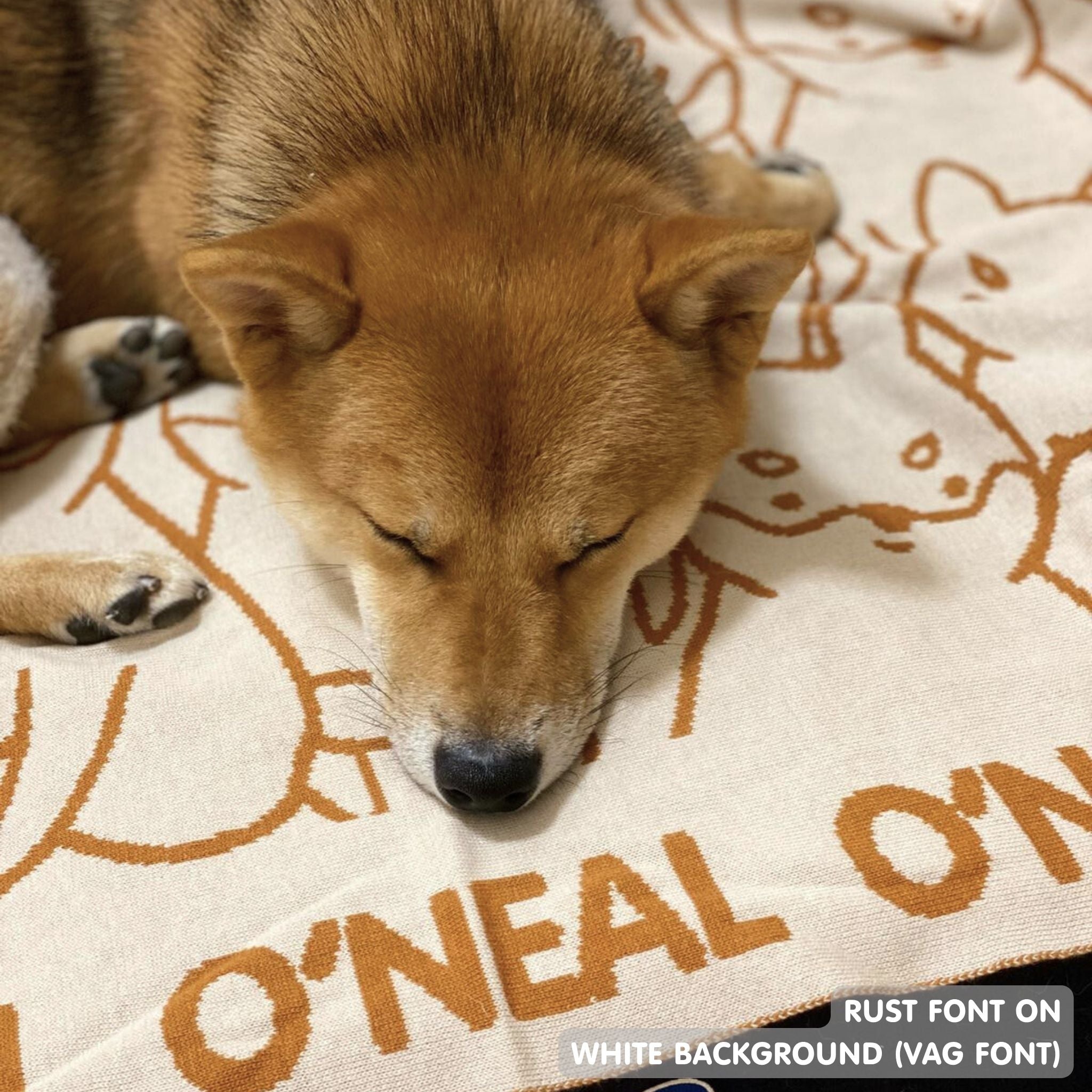Personalised pet blanket for Shiba in oatmeal and mustard knitted cotton, custom dog blanket by TinyBitz, styled on modern wooden dog bed.