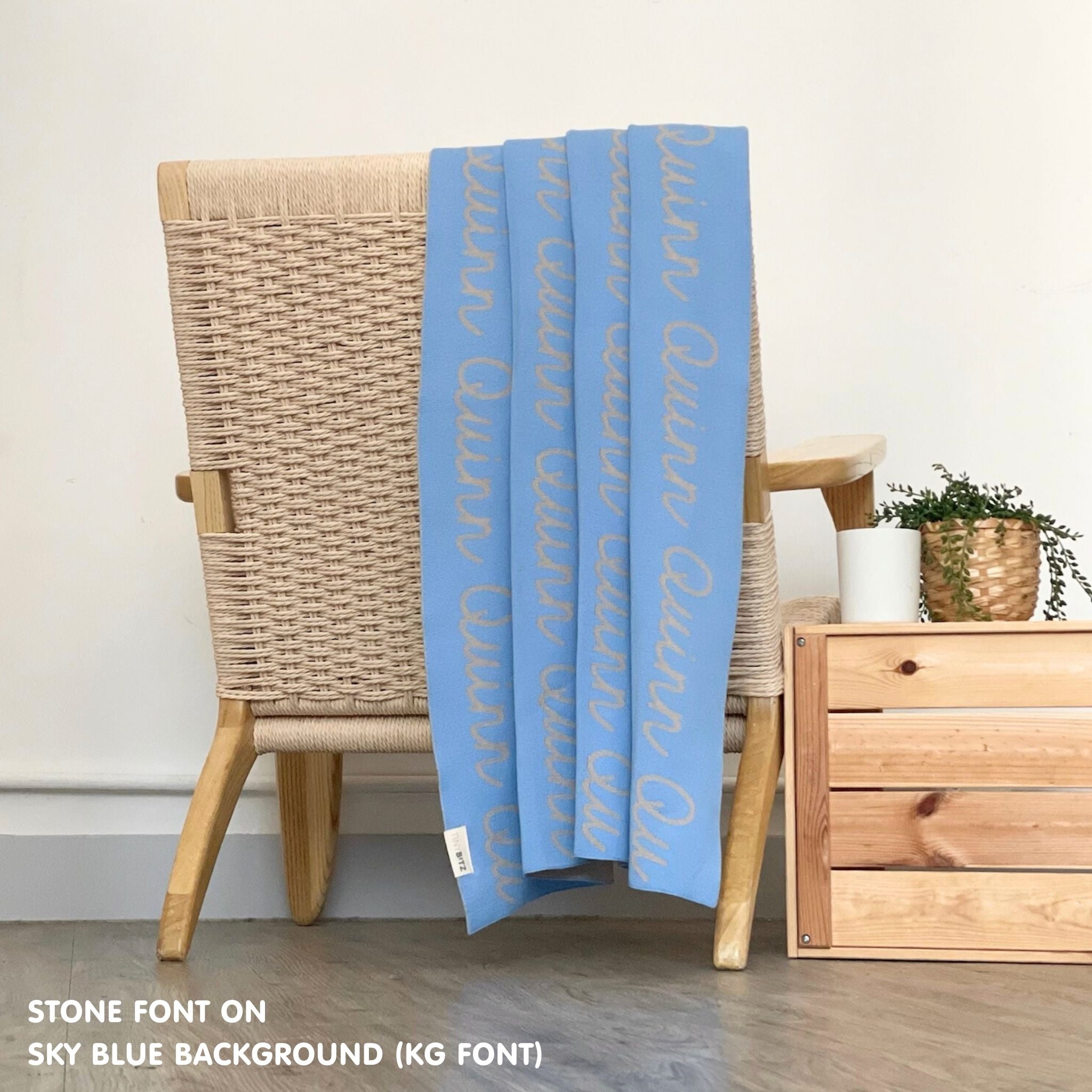 Personalised pet blanket in sky blue and stone knitted cotton, custom knitted dog blanket by TinyBitz, perfect gift for dog lovers.