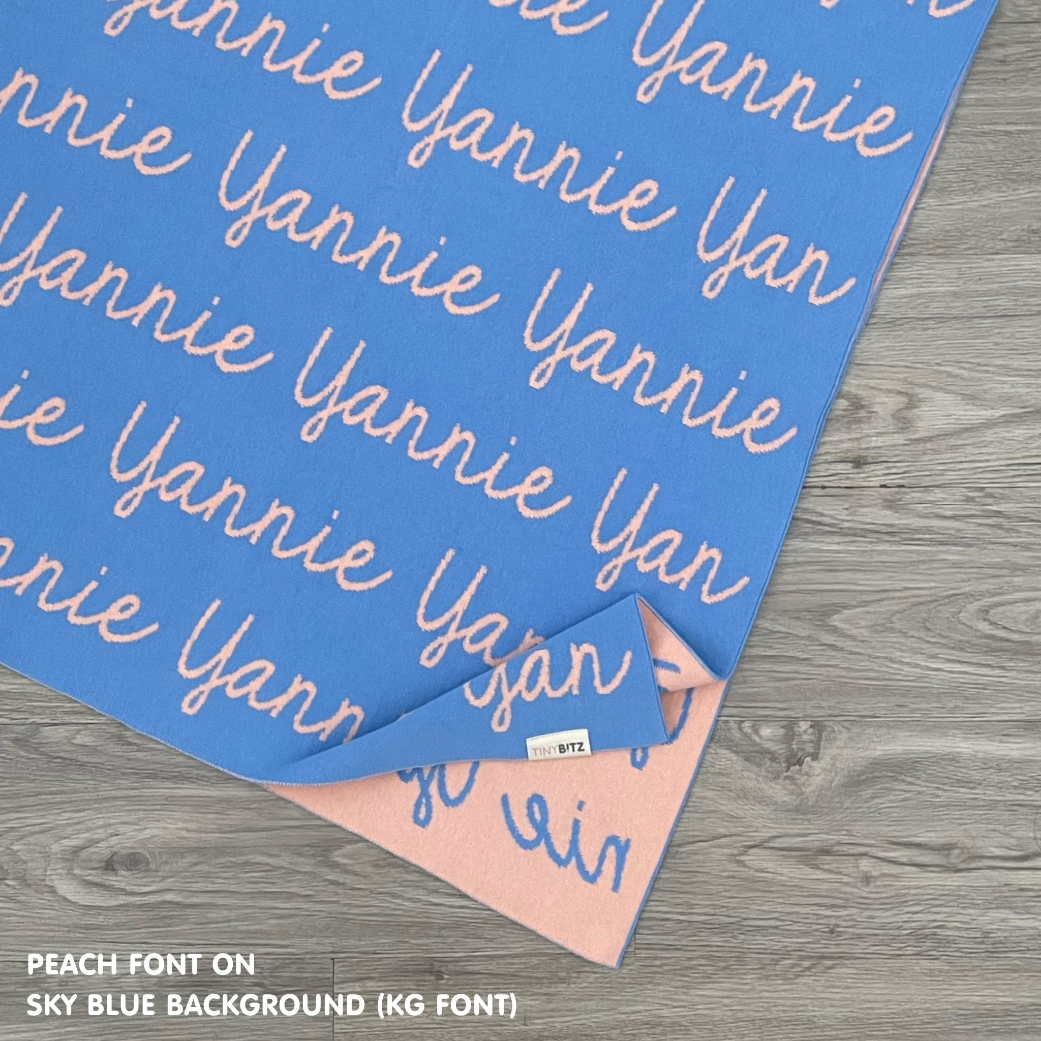 Personalised pet blanket in sky blue and peach knitted cotton, cozy custom dog blanket by TinyBitz, perfect personalized gift for pet lovers.