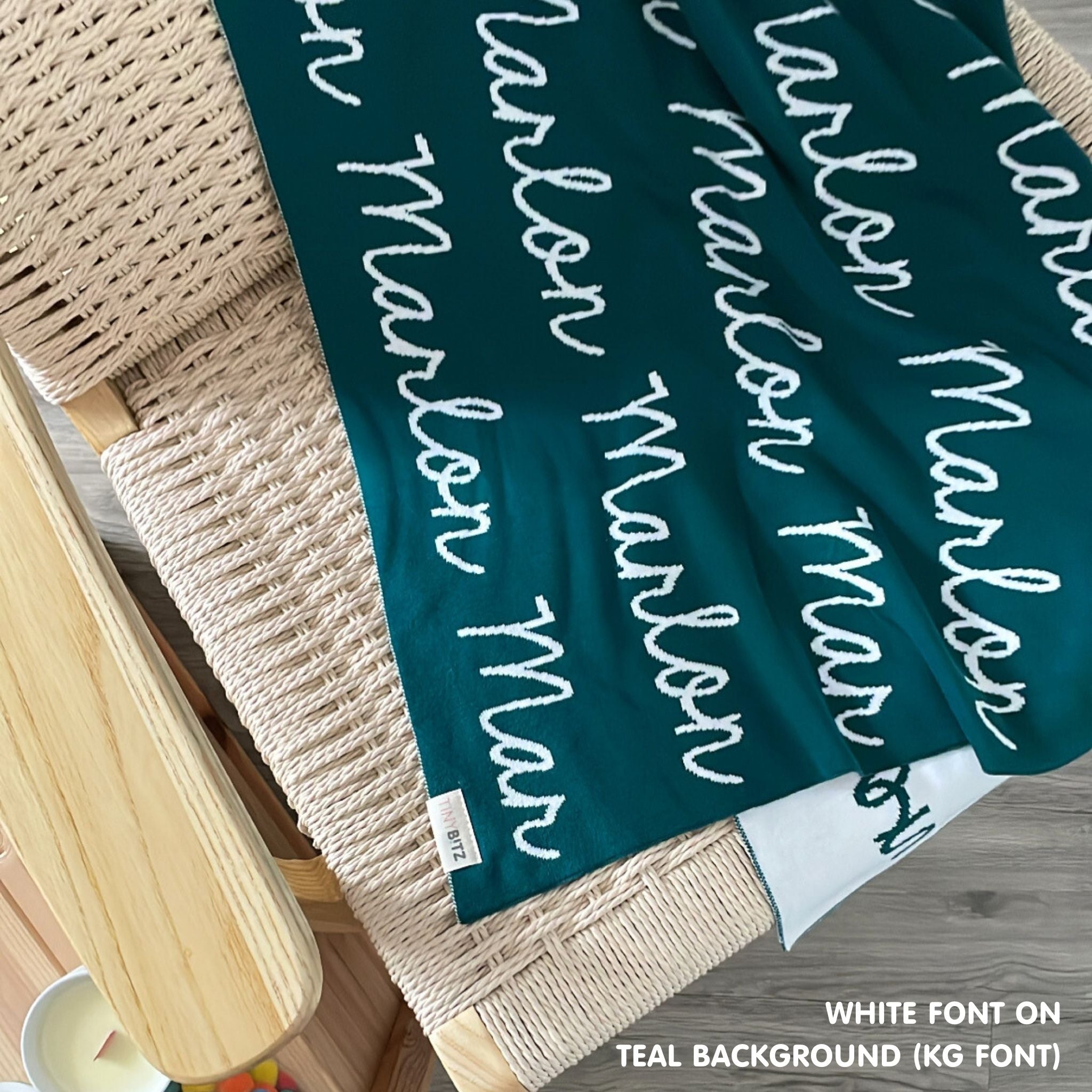 Personalised pet blanket in teal and white knitted cotton, cozy custom cat blanket by TinyBitz, perfect personalized gift for pet lovers.