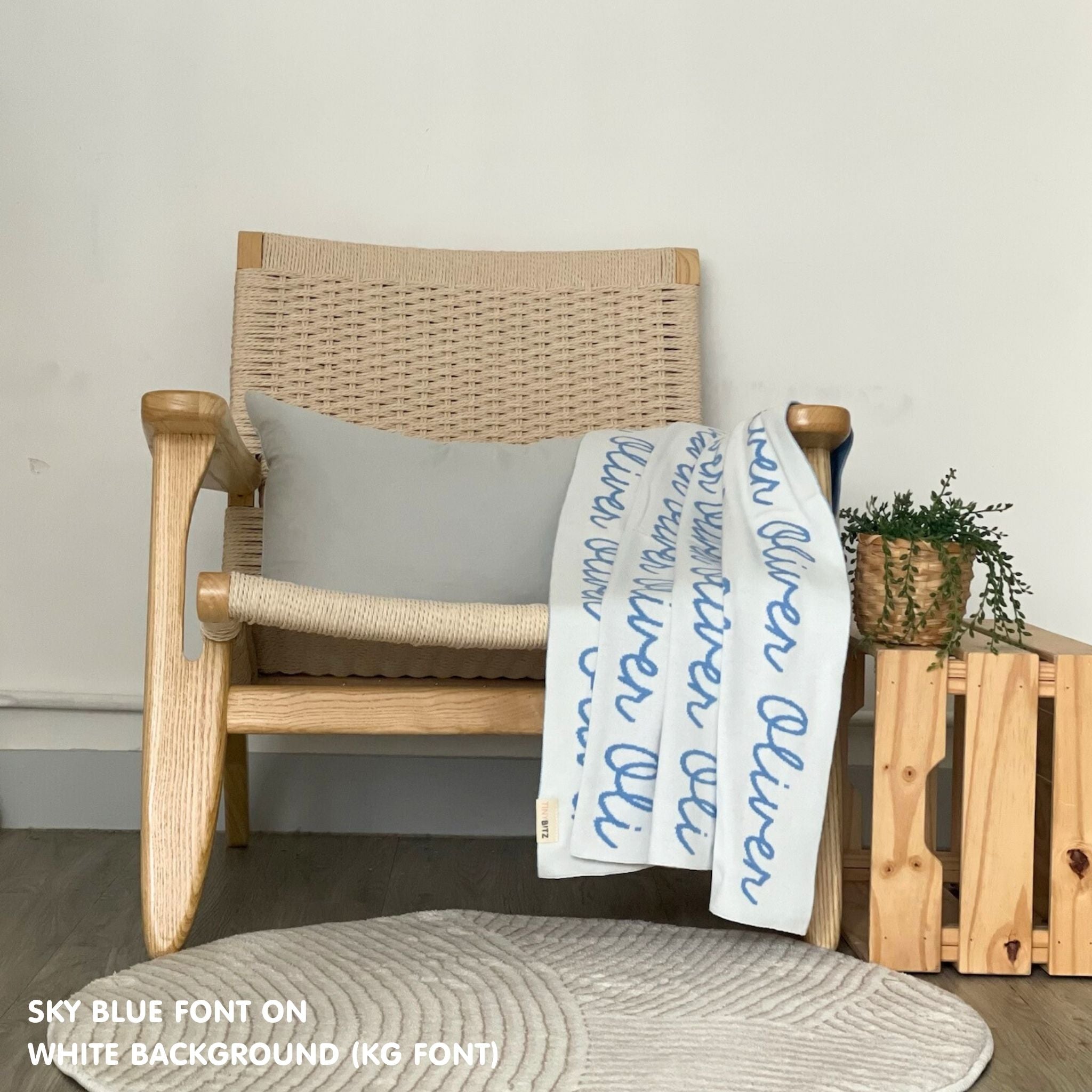 Personalised pet blanket for dogs in white and sky blue knitted cotton, custom knitted dog blanket by TinyBitz, perfect gift for cat lovers.