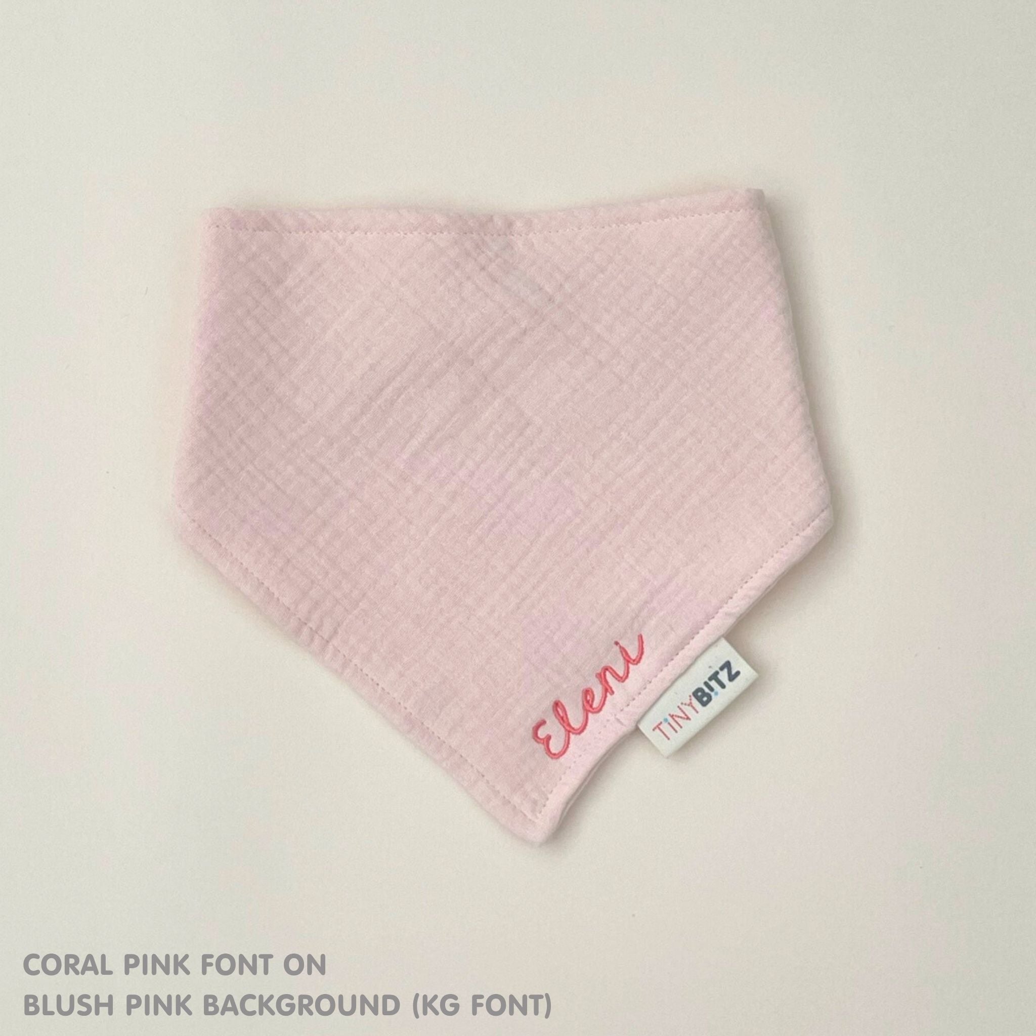 Organic cotton baby bib with name stitched on blush pink fabric, personalised baby gifts by TinyBitz.