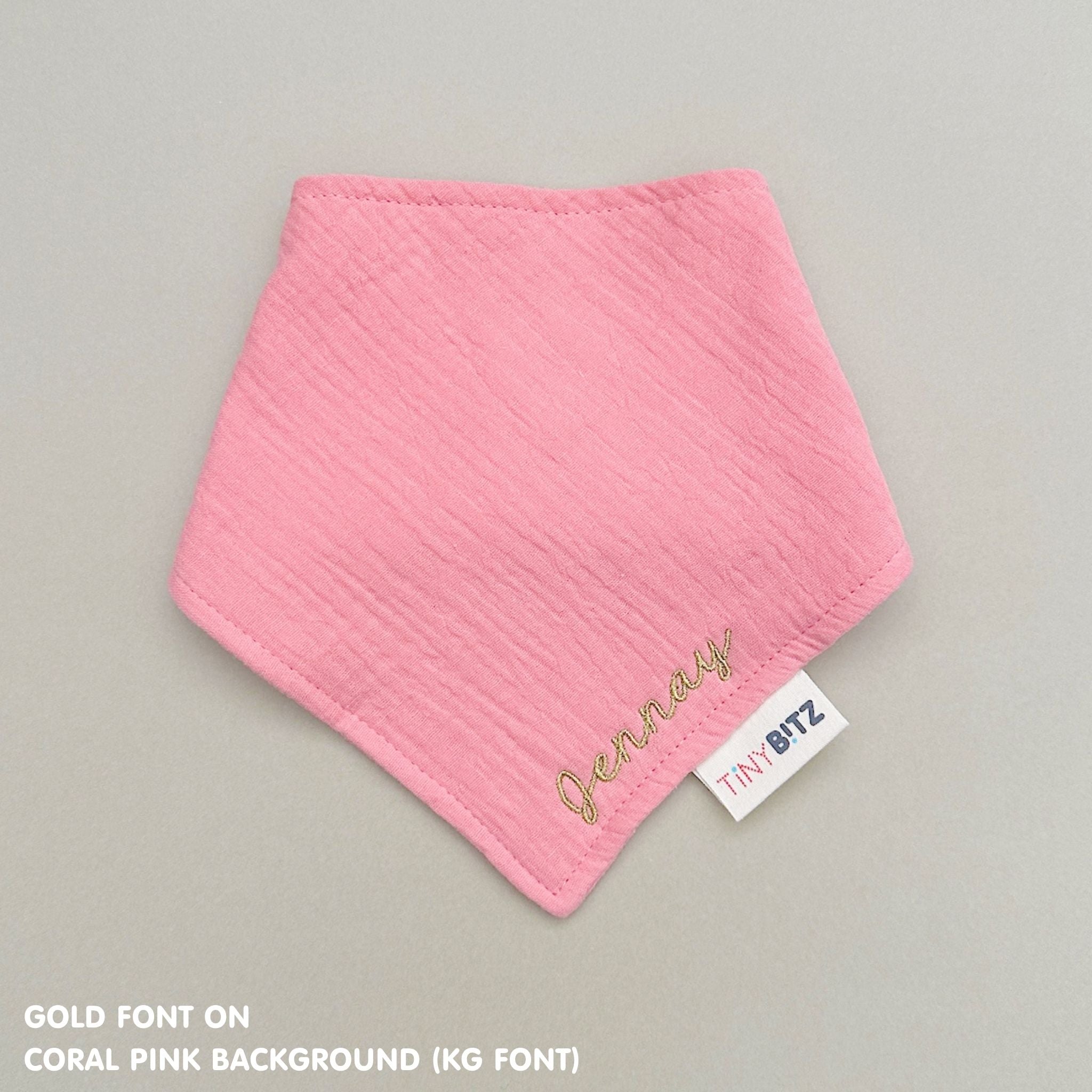 Neutral-toned personalised baby bib with minimalist name embroidery, custom made to order newborn gift by TinyBitz.