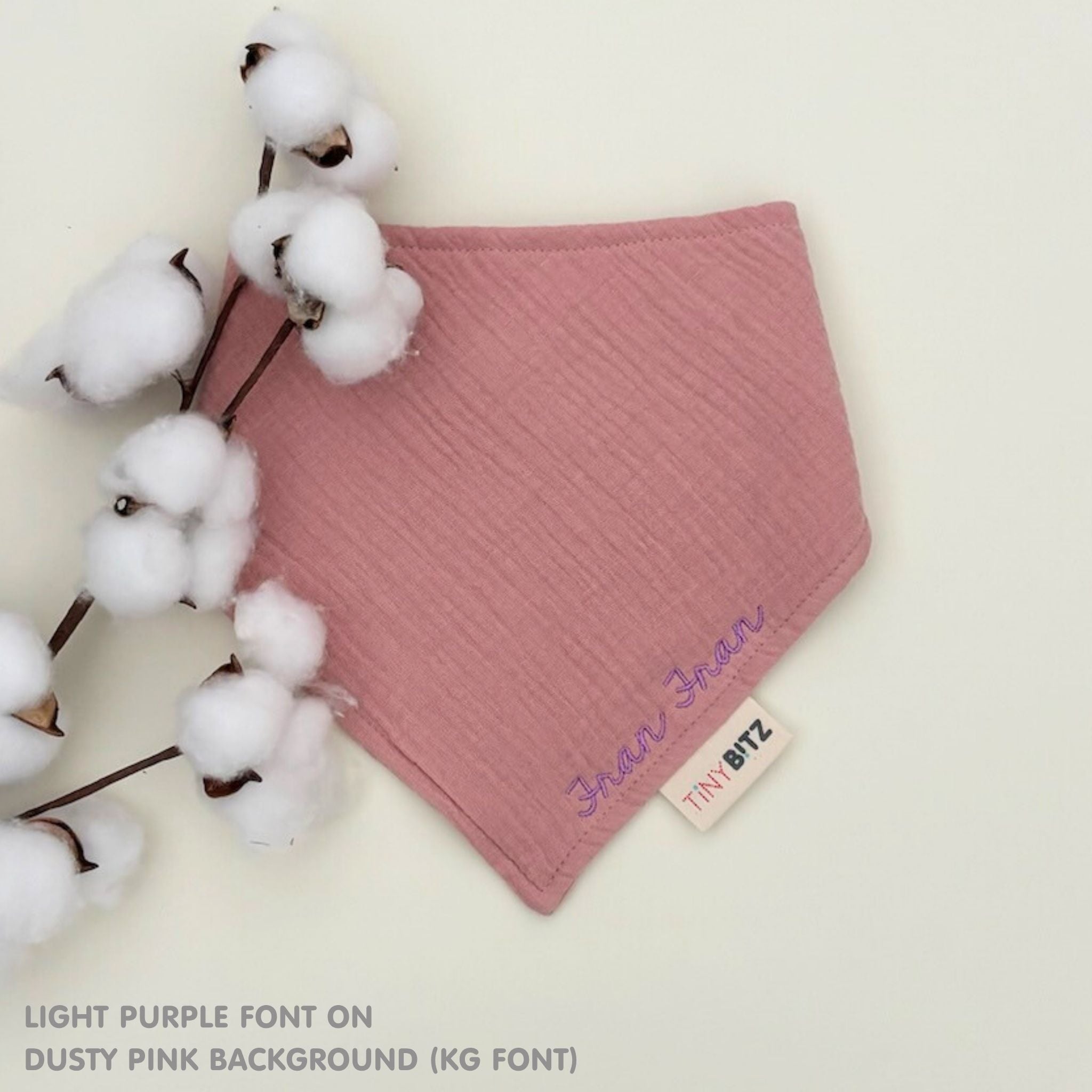 Organic cotton baby bib with name stitched on dusty pink fabric, personalised baby gifts by TinyBitz.