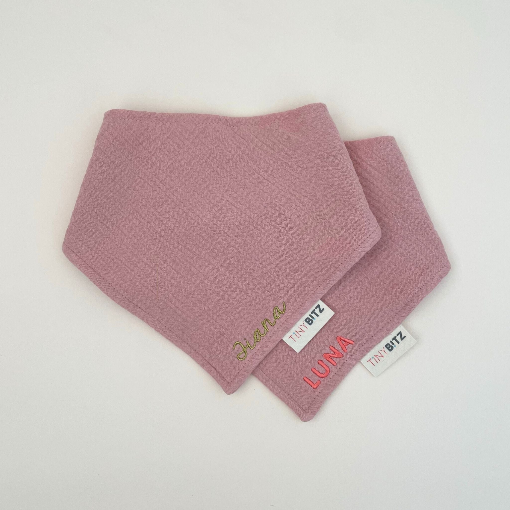 Organic cotton baby bib with name stitched on dusty pink fabric, personalised baby gifts by TinyBitz.