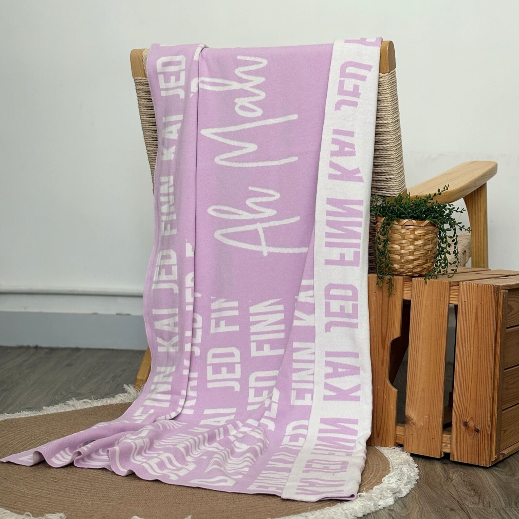 Personalized blanket with mum's name in the centre surrounded by her kids' names, custom made by TinyBitz.