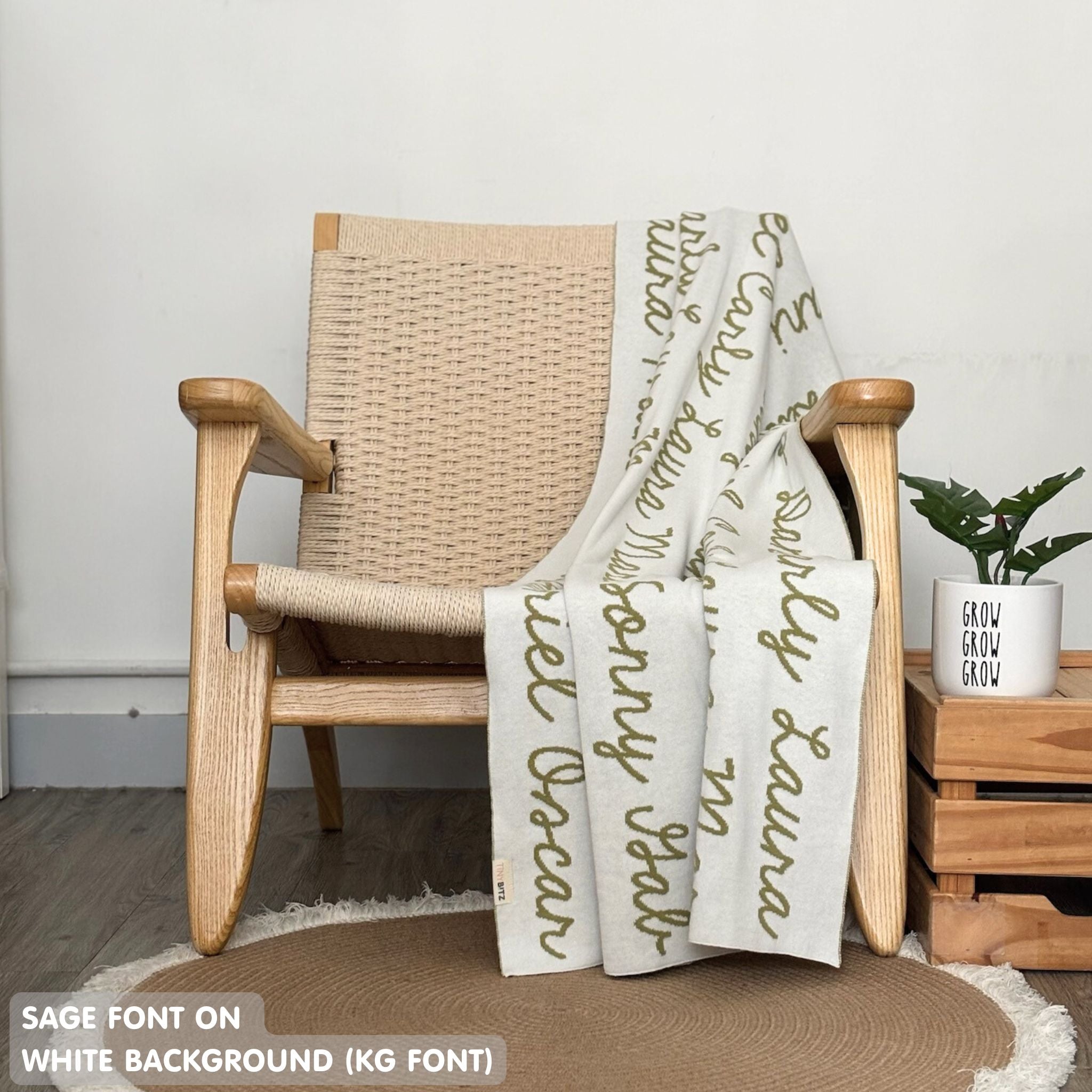 Custom knitted blanket with family members' names on it, making it the best personalised family gift!