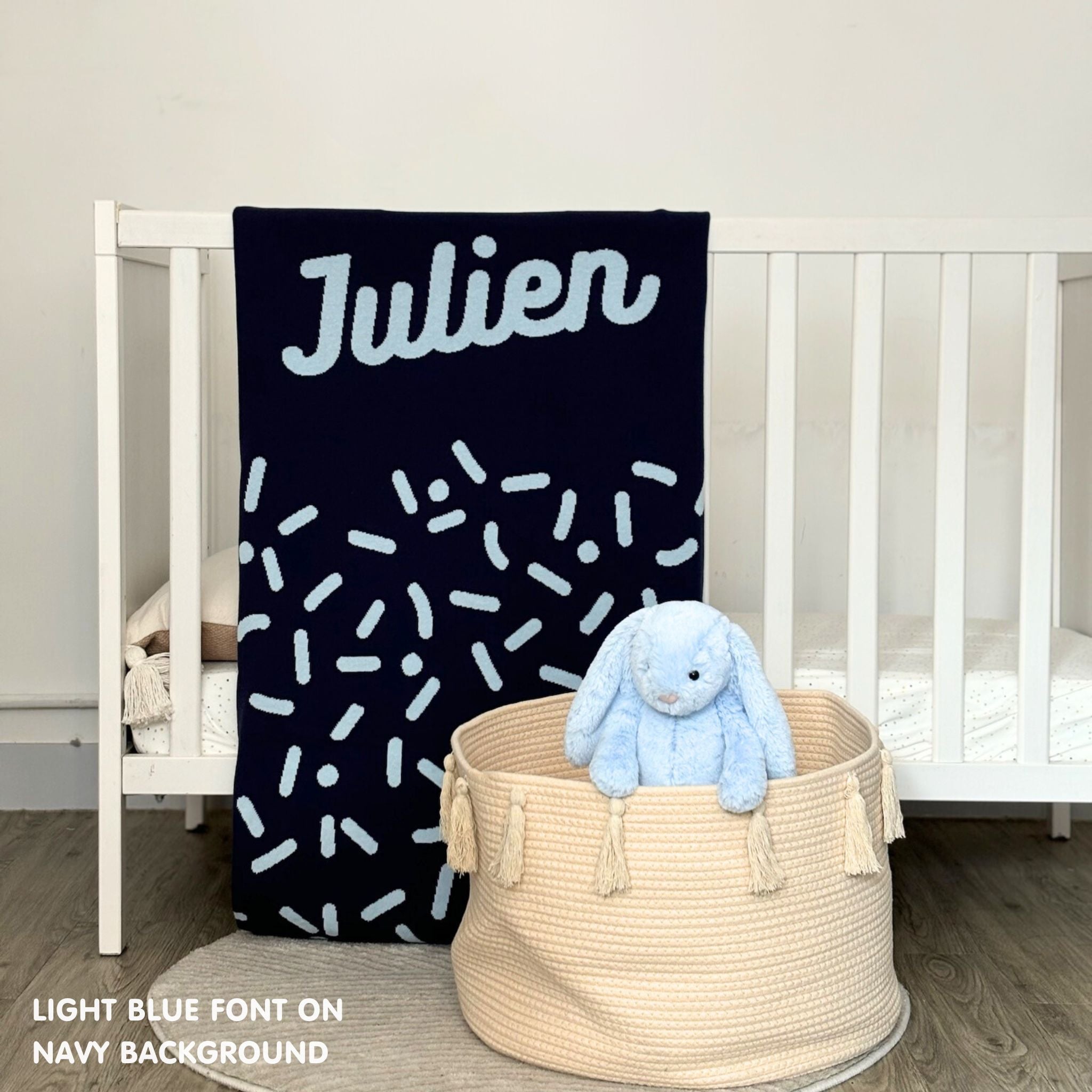 TinyBitz personalized baby name blanket, knitted in navy and light blue with a confetti pattern, perfect baby shower gift!