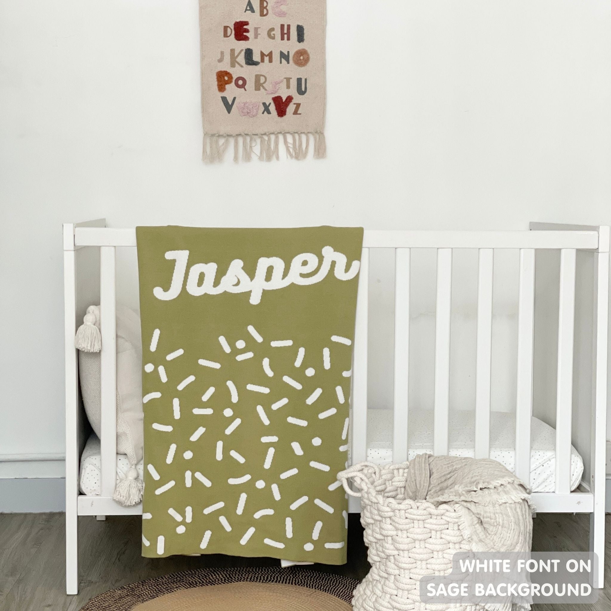 TinyBitz personalized name blanket in sage and white with a confetti pattern, perfect gift for newborn babies and kids.