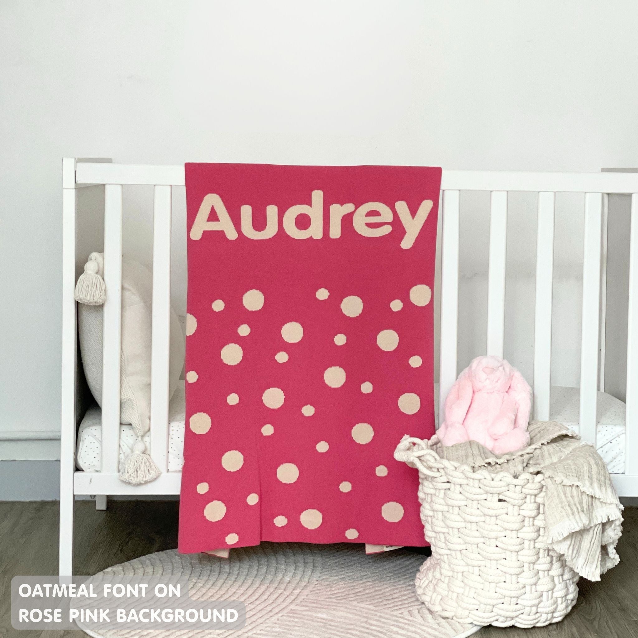 TinyBitz personalized name blanket in rose pink and oatmeal with a dot pattern, perfect gift for newborn babies.