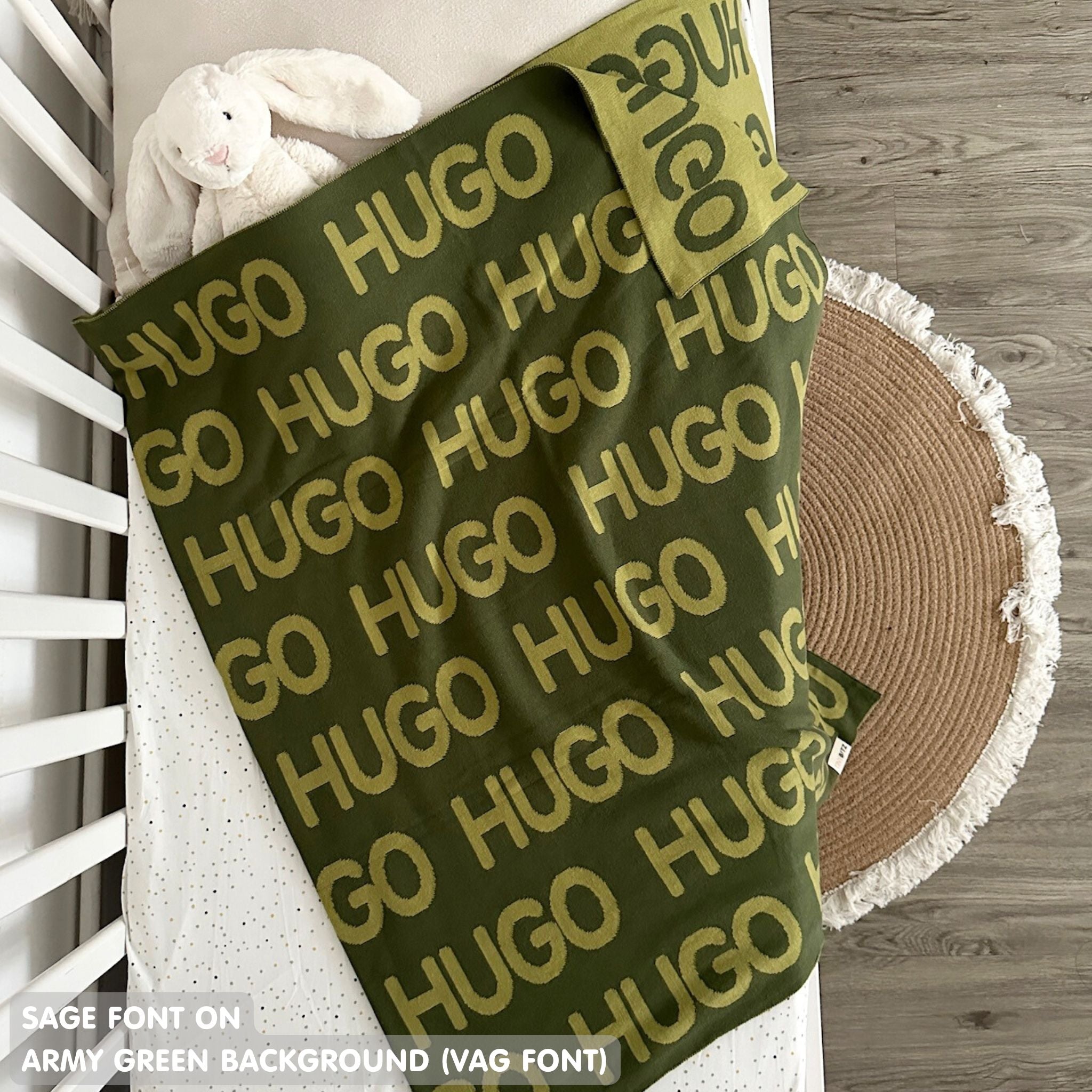 TinyBitz personalized knitted blanket in army green background, customized with baby's name and made from 100% cotton.