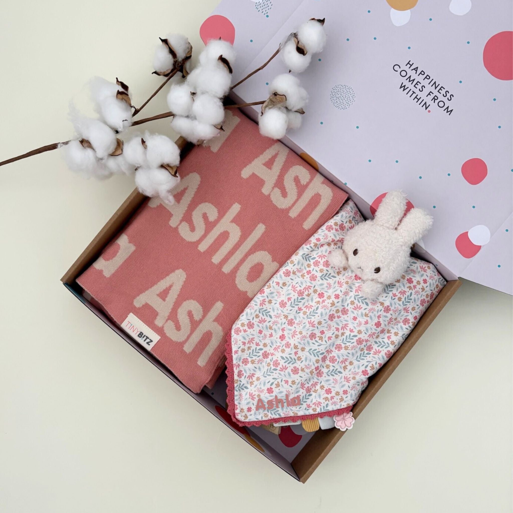 Gift bundle featuring a personalised knitted name blanket by TinyBitz and Miffy cuddle cloth with embroidered name, a thoughtful baby shower or newborn gift set.