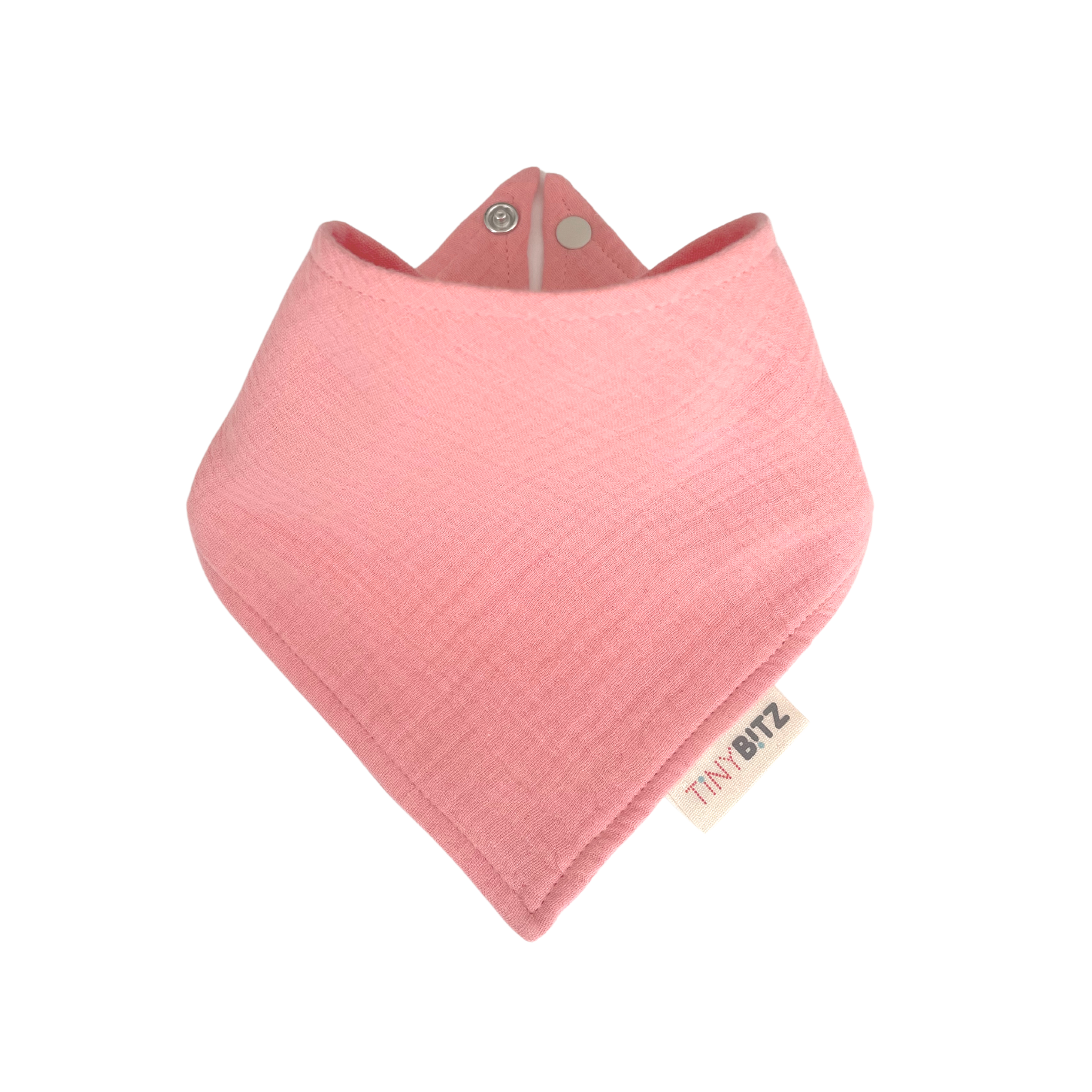 Coral pink organic muslin bib, perfect for baby gifts and keepsake accessories.