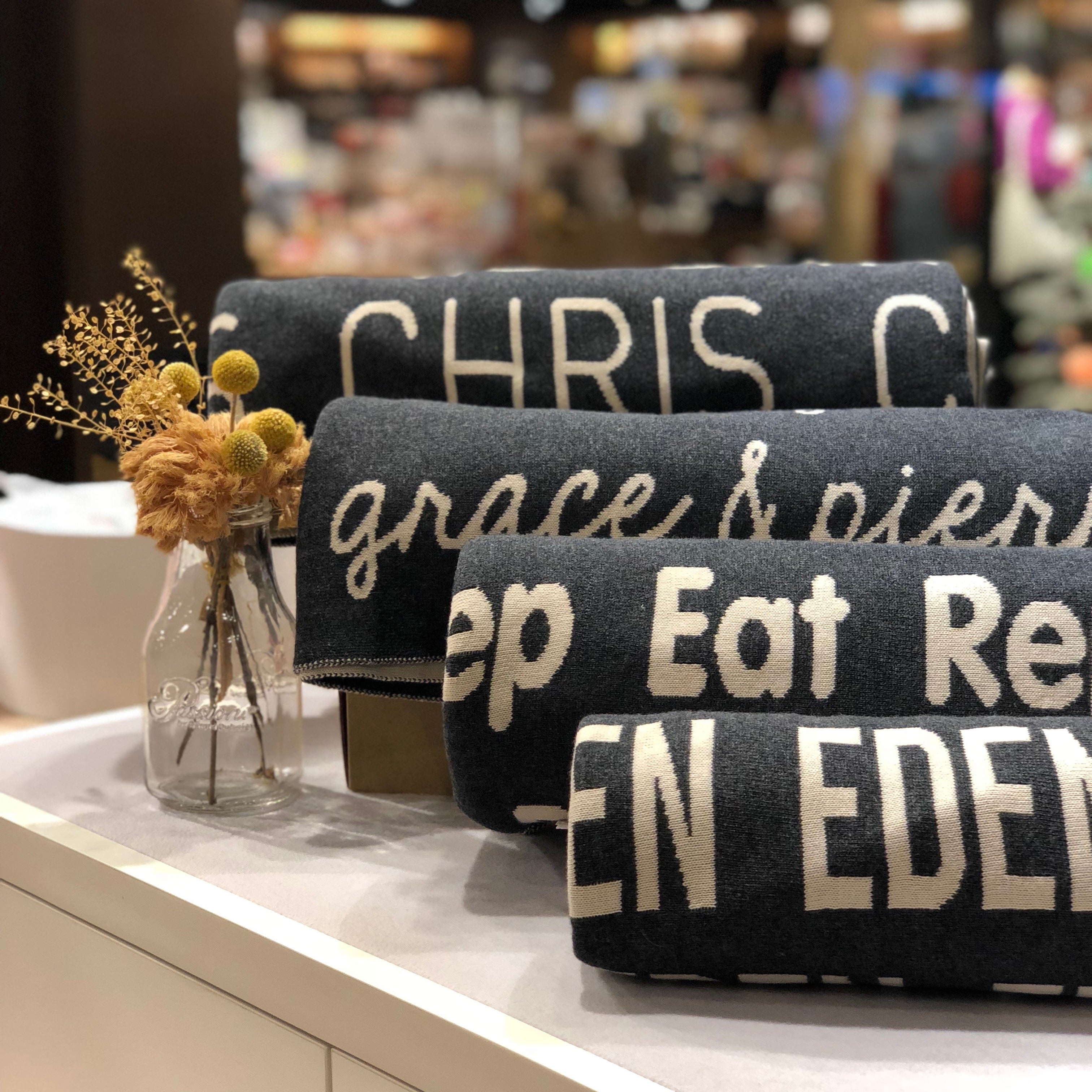 TinyBitz Custom Blanket knitted from cotton with baby's name on charcoal background, best gift to welcome a newborn baby.