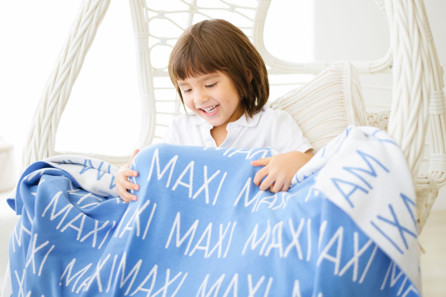 Personalized knitted name blanket in blue for boys