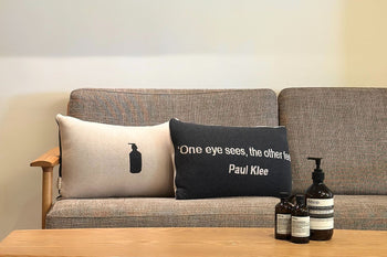 Aesop personalized cushion with company logo