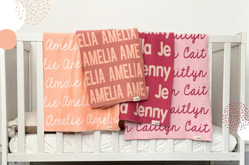 Personalized pink knitted name blanket