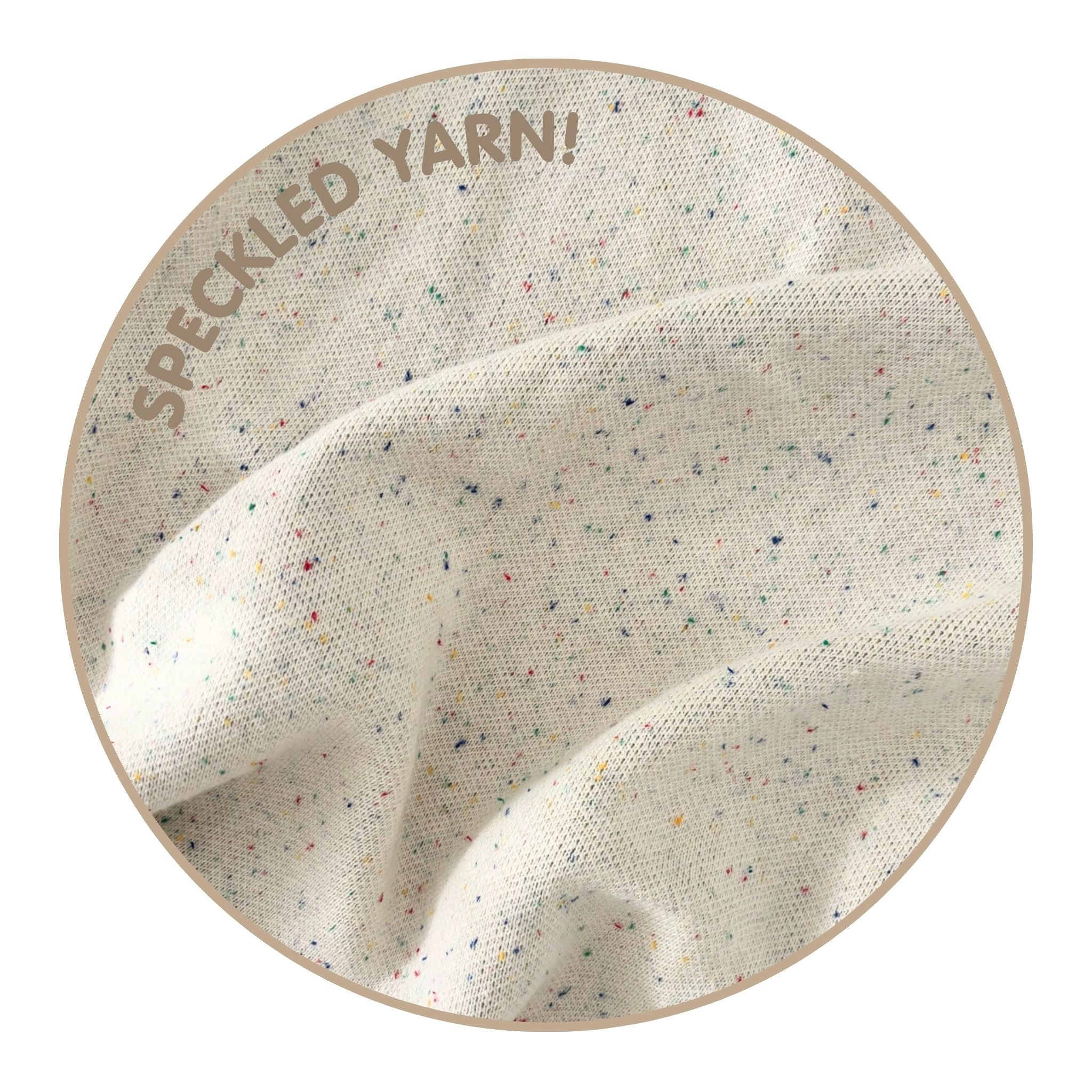 Knitted baby blanket in cream with a confetti pattern, customised with baby's name, made by TinyBitz.