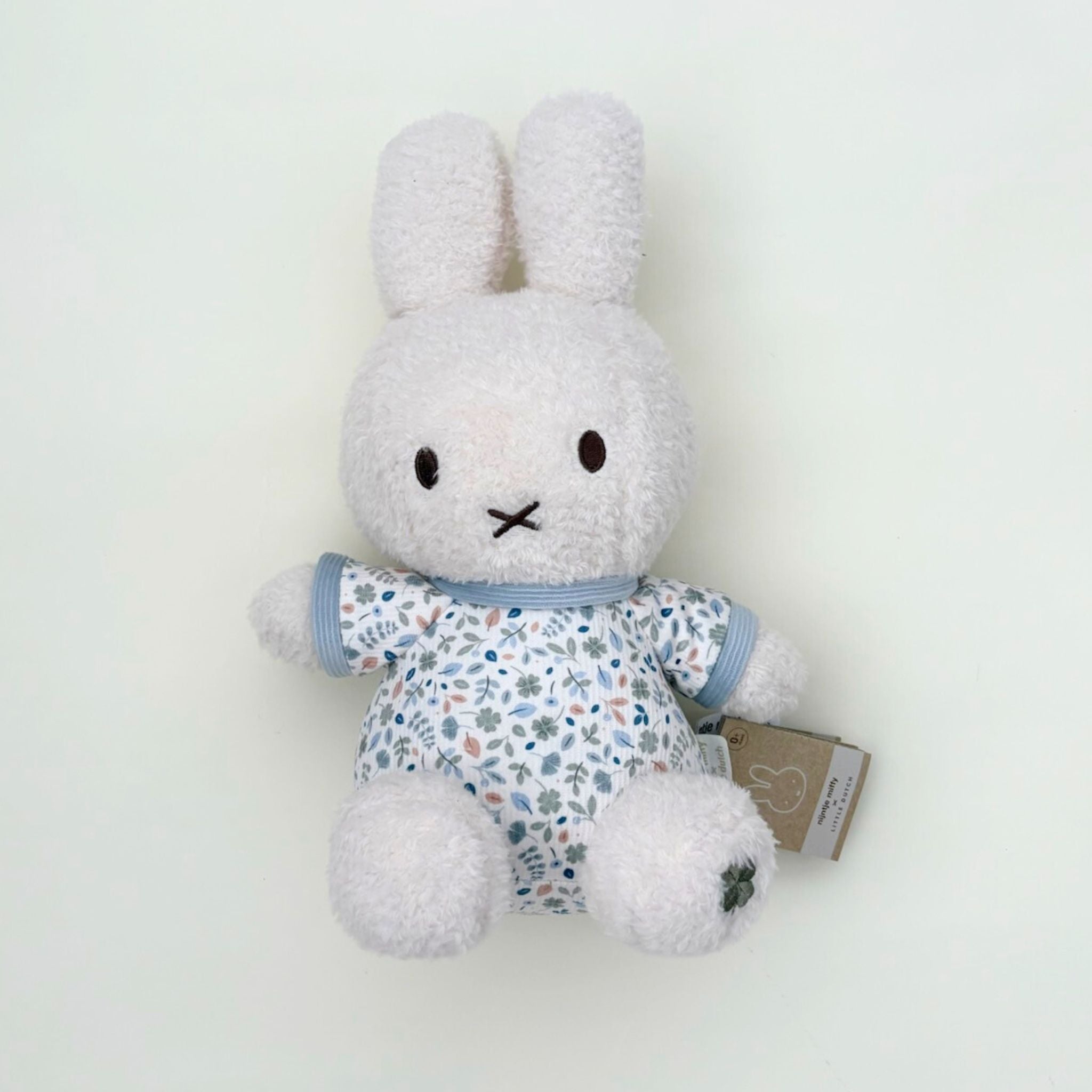 Floral Miffy plush toy with rattle in blue, perfect for newborns, baby showers, and Miffy toy lovers.