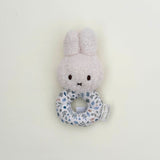 Floral Miffy plush toy with rattle in blue perfect for newborns, baby showers, and Miffy toy lovers.
