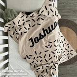 TinyBitz personalized baby name blanket, knitted in oatmeal and charcoal with a confetti pattern, perfect baby shower gift!