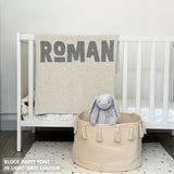 TinyBitz personalized baby name blanket, knitted in cream and light grey with a confetti pattern, perfect baby shower gift!