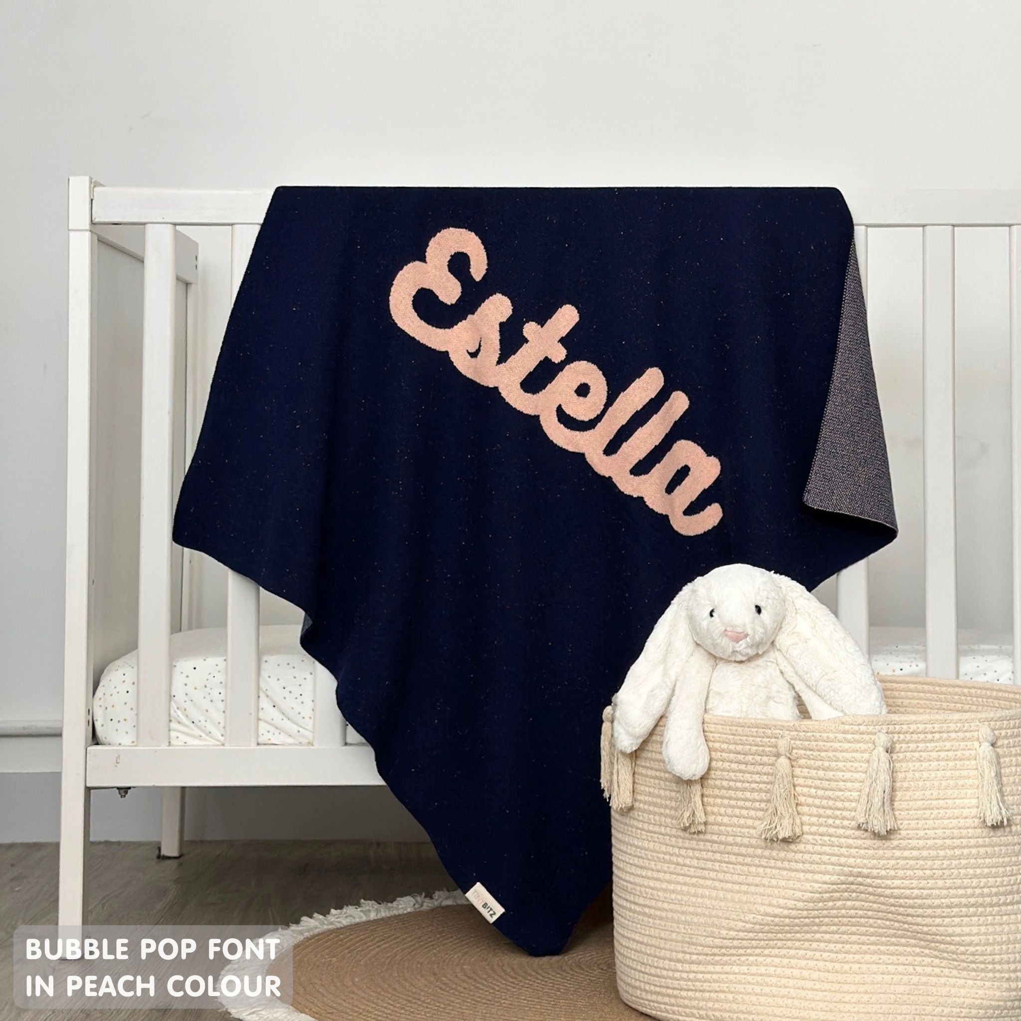 TinyBitz personalized kids knitted name blanket in navy with a confetti pattern, perfect gift for birthdays!
