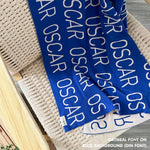 Personalised pet blanket in blue and oatmeal knitted cotton, custom knitted dog blanket by TinyBitz, perfect gift for dog lovers.