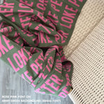 Personalised blanket for adult knitted from cotton in army green and rose pink, custom made by TinyBitz.