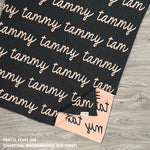 TinyBitz knitted name blanket in charcoal and peach can be used to decorate your baby's room!