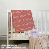 TinyBitz knitted baby girls blanket in dusty pink background and light purple, personalized with your baby’s name.