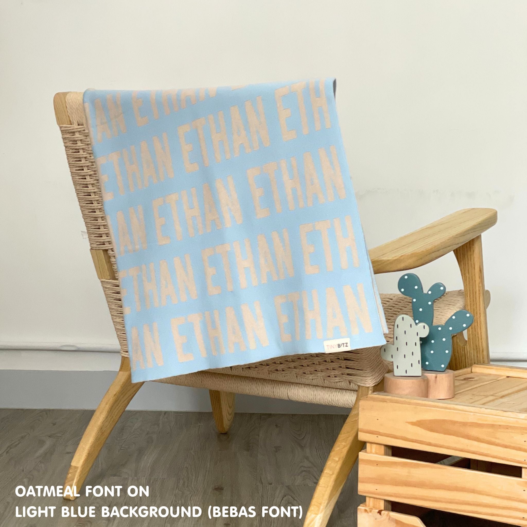 TinyBitz knitted cotton blanket in light blue and oatmeal, personalised with your own name!