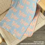 Personalised pet blanket in light blue and peach knitted cotton, cozy custom cat blanket by TinyBitz, perfect personalized gift for pet lovers.