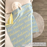 TinyBitz Custom Blanket knitted from cotton with baby's name on light blue background, best gift to welcome a newborn baby.