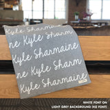 Personalized blanket with couple's name knitted in light grey and white, made by TinyBitz.