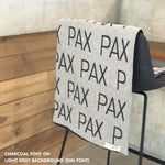 Personalised blanket for adult knitted from cotton in light grey and charcoal, custom made by TinyBitz.