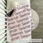 TinyBitz Personalized baby knitted name blanket in light pink and charcoal, making the best baby shower gift!