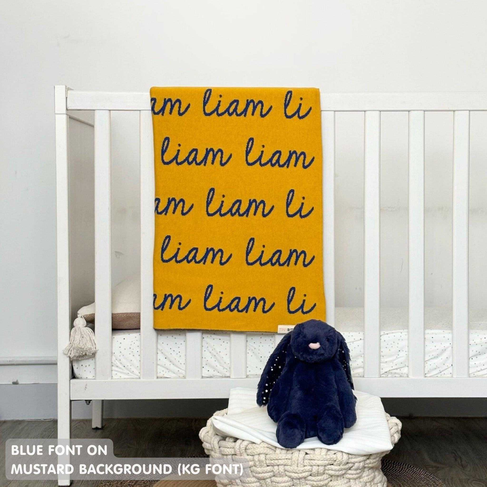 Knitted baby blanket in mustard and blue, customised with baby's name, made by TinyBitz.