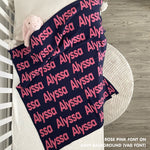 Baby blanket knitted from cotton personalized with baby's name in navy and rose pink, made by TinyBitz.