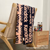 TinyBitz Personalized name blanket in navy and peach, perfect gift for newborn babies.