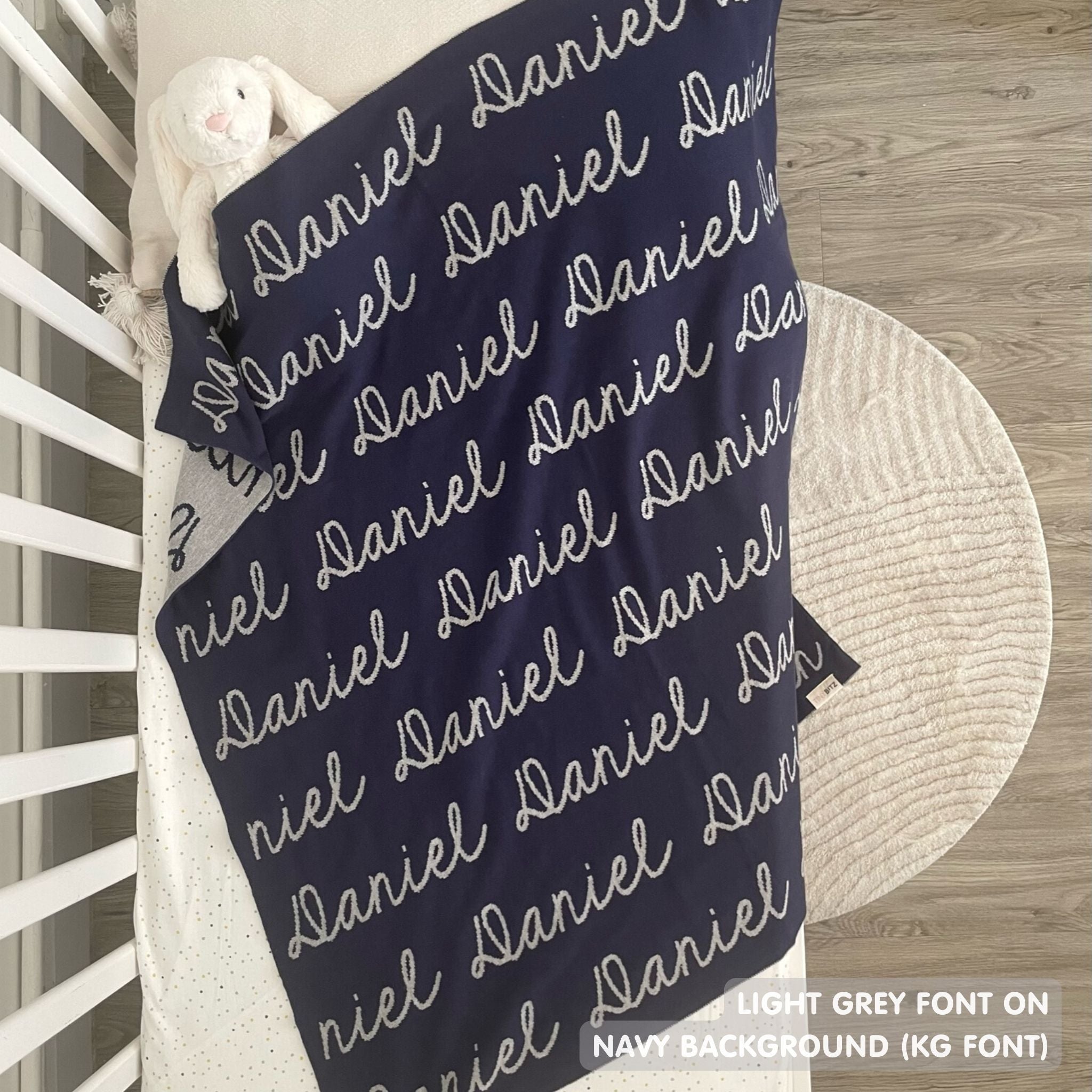 TinyBitz Custom Blanket knitted from cotton with baby's name on navy background, best gift to welcome a newborn baby.
